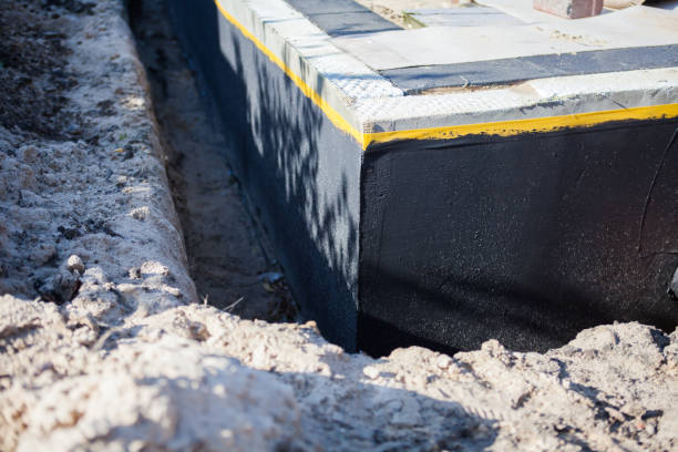 Professional Wet Basement Repair technician working in Helmsburg, IN